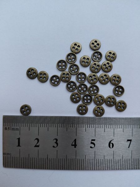 Гудзики мініатюрні металеві 6 мм Pug-14 фото